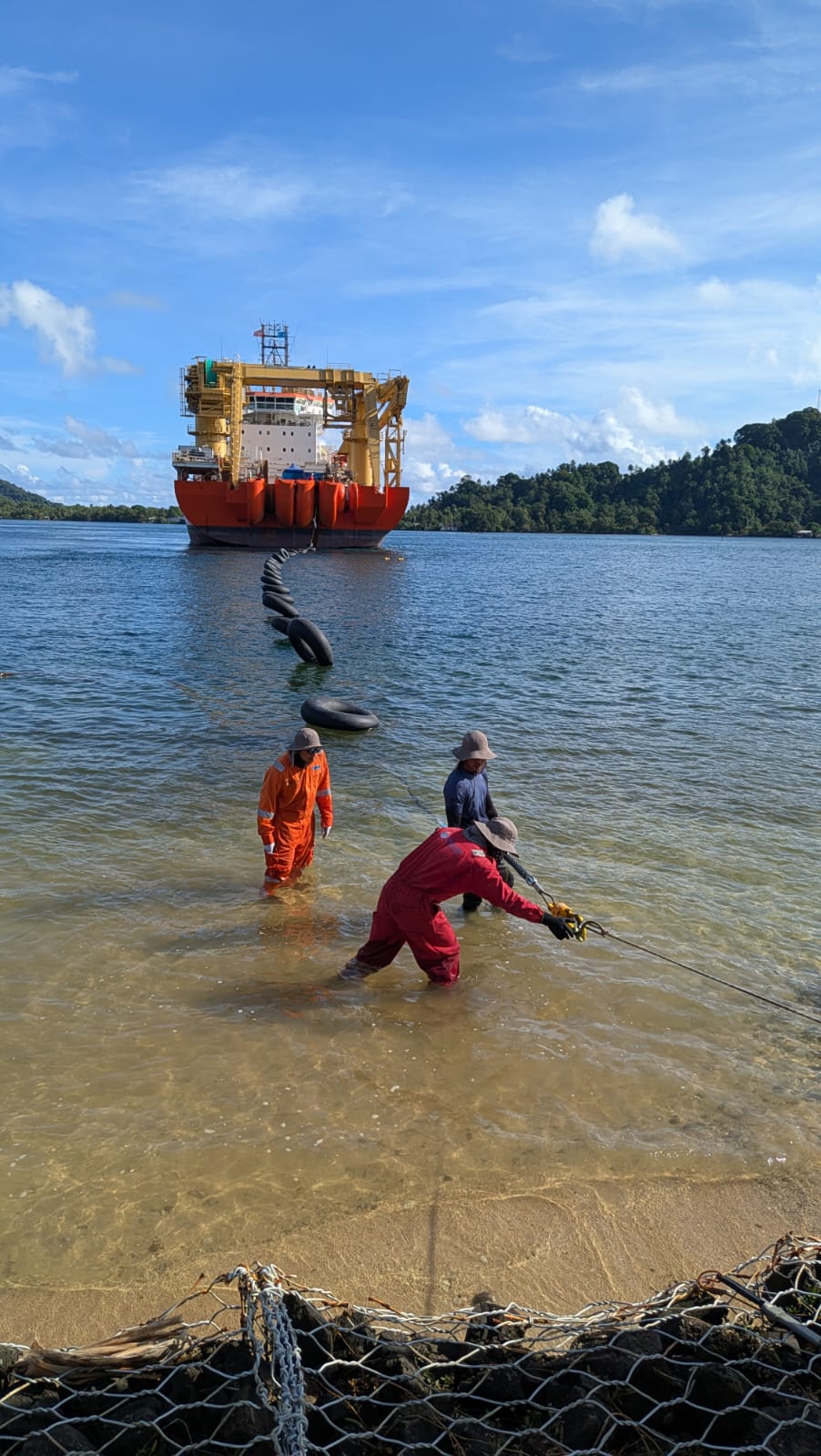 The cable being pulled to shore in Kosrae