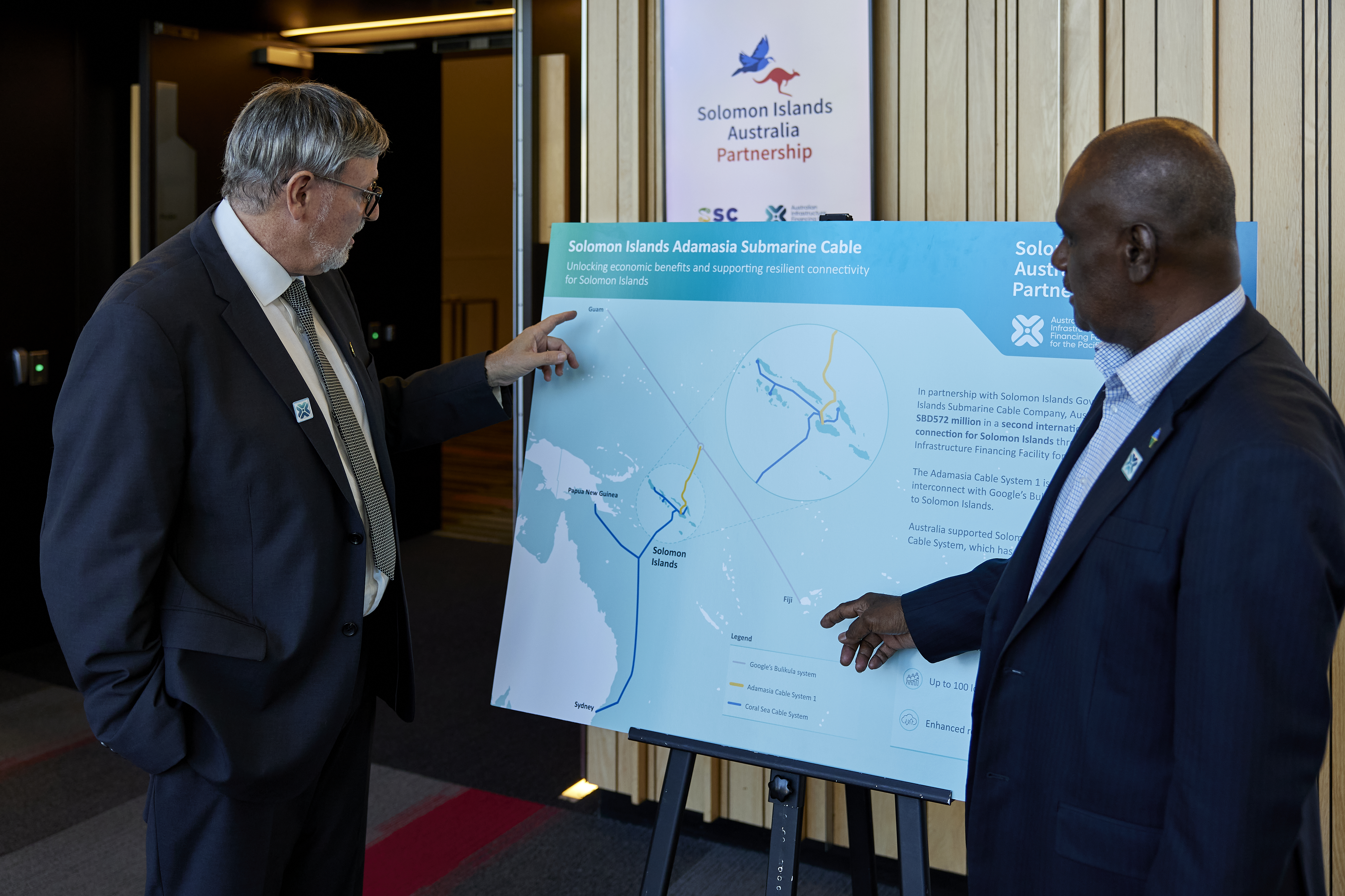 Adamasia Cable Launch - Prime Minister Manele and CEO SISCC inspecting the Solomon Islands Cable board and Adamasia Cable route
