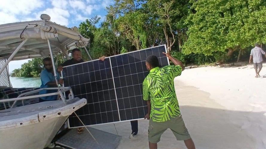 Solar panels unloading at Loh, Torres from one of HELPR-1’s landing craft, Explorer, by Vanuatu Institute of Technology students who shadowed the HELPR-1 Climate Adaptation team as part of their work experience