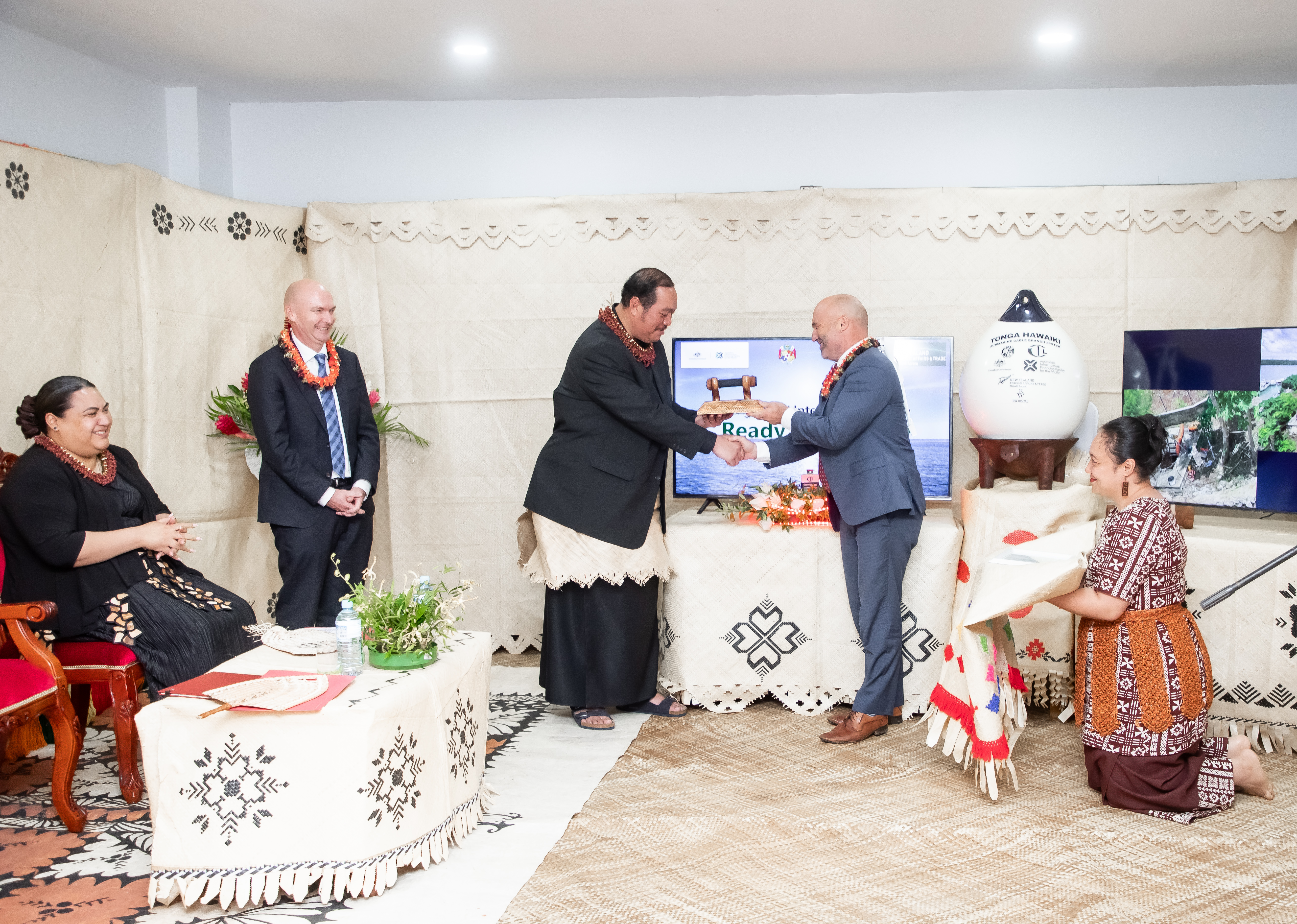 Representatives from Tonga, Australia and New Zealand at the cable's completion event in May 2026.